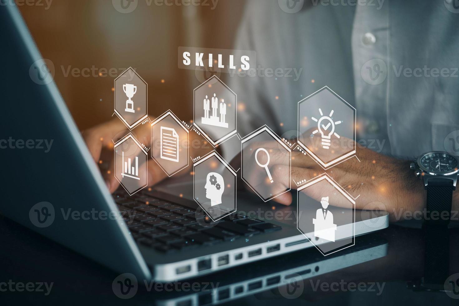 Businessman using a computer to New Skills Knowledge Webinar Training Business Internet Technology Concept. photo