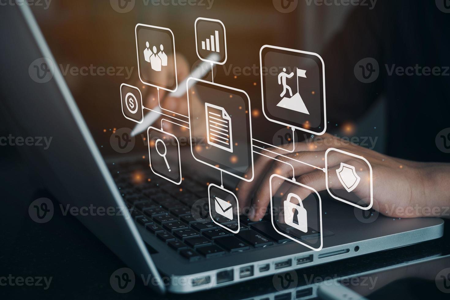 business woman using computer with virtual icons. Document Management System DMS being setup working on laptop computer in office. digital marketing. photo