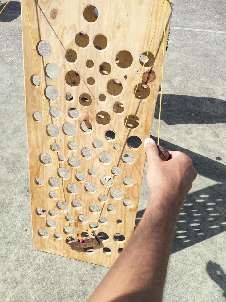 Giant wooden vertical labyrinth game photo