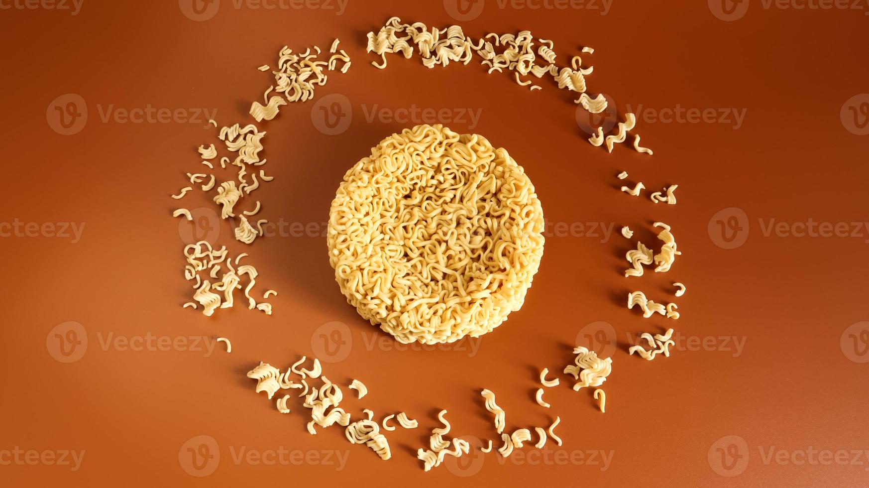 Instant noodles asian ramen. Dry yellow raw food noodles. pasta, for the preparation of which it is enough to pour boiling water and wait a few minutes. Copy space korean and japanese vermicelli. photo