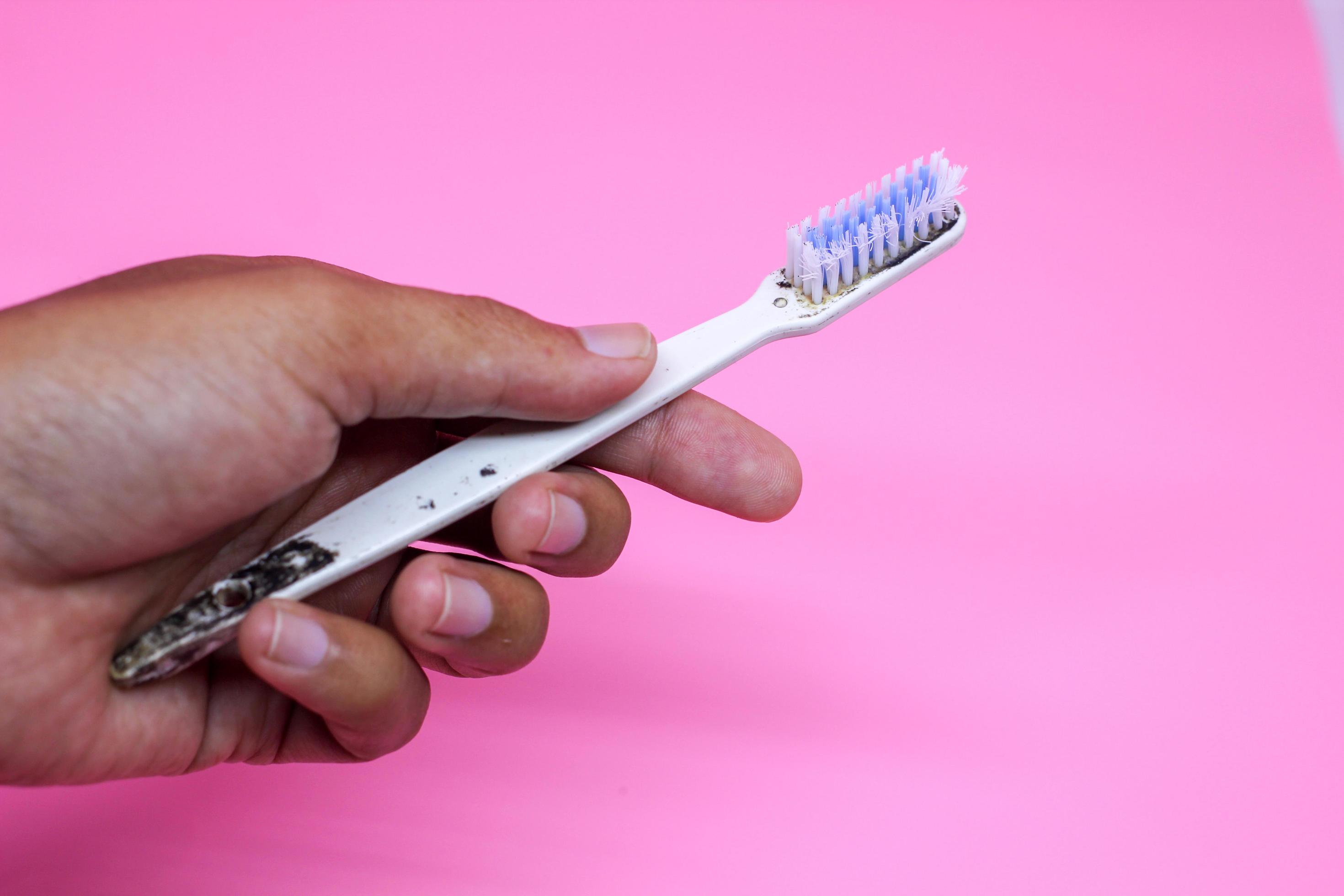 Old broken toothbrush 5543861 Stock Photo at Vecteezy