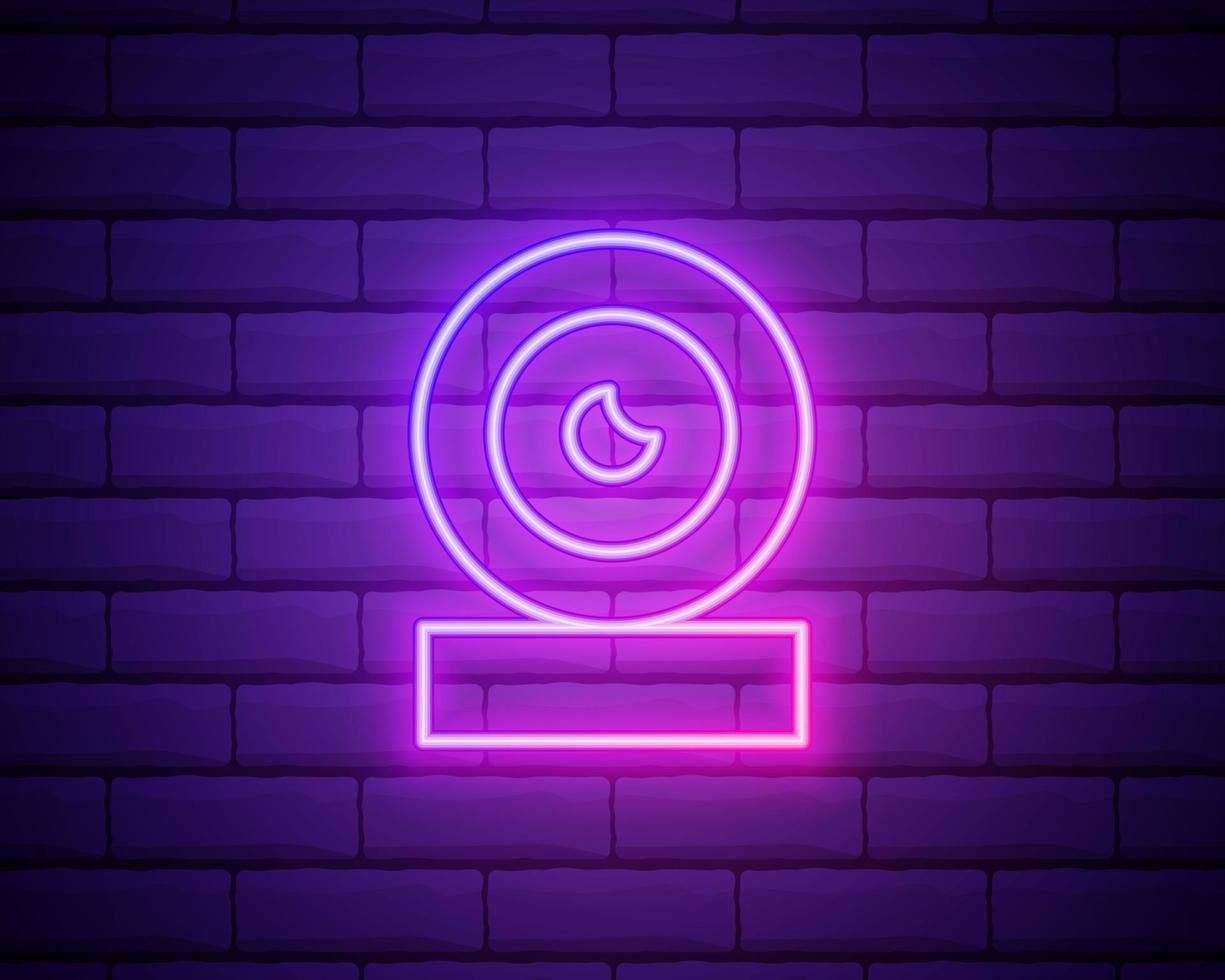 Glowing neon line Web camera icon isolated on brick wall background. Chat camera. Webcam icon. Colorful outline concept. Vector