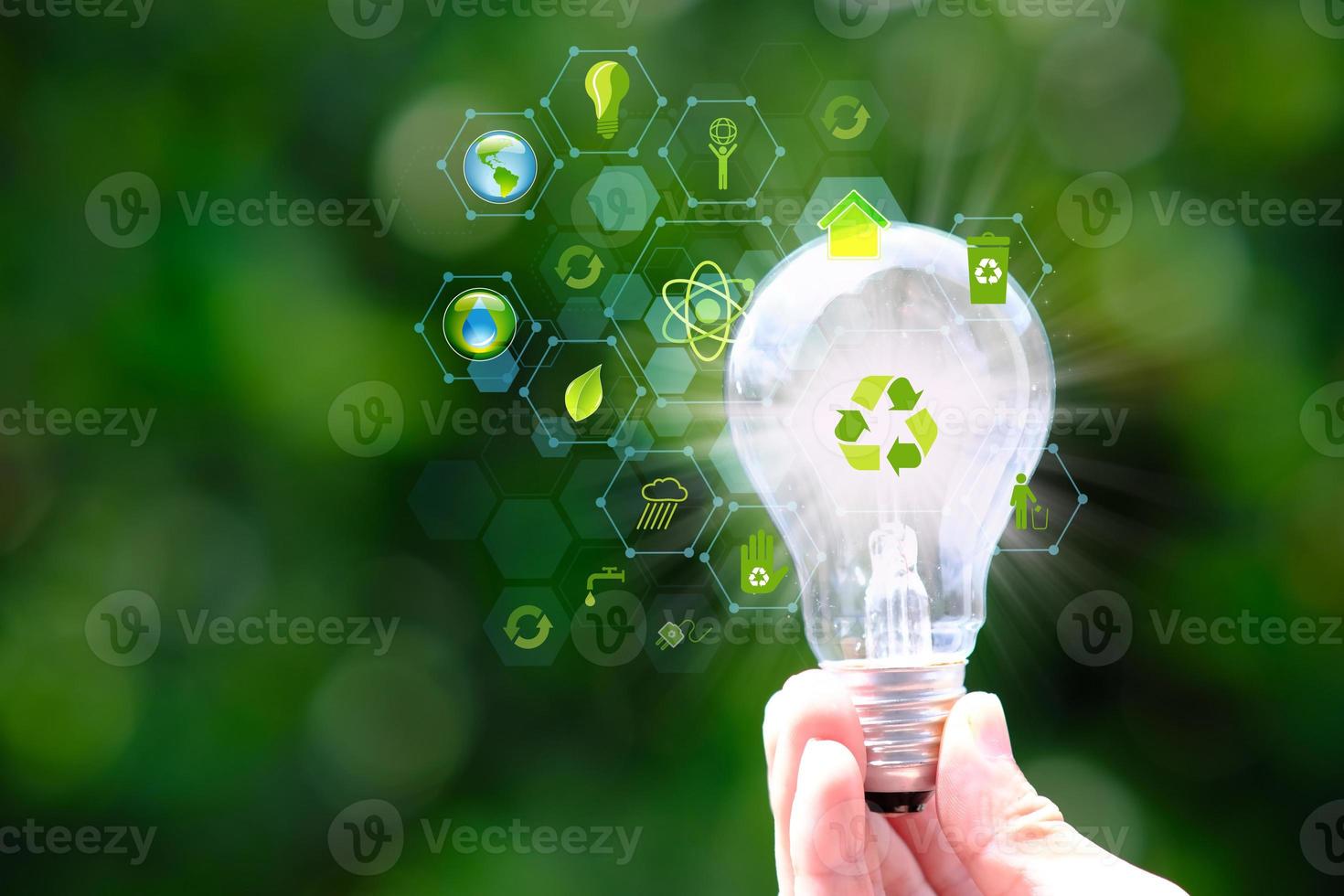 Energy saving light bulb and save world concept, sustainable development. Ecology concept, Green energy concept energy sources sustainable Ecology Elements, save world concept, World environment day photo
