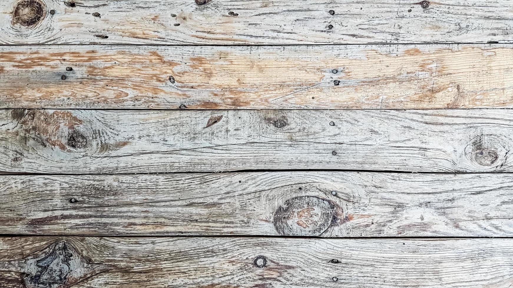 Fondo de textura de madera de tablón grunge. cerca de paneles de valla de madera gris foto