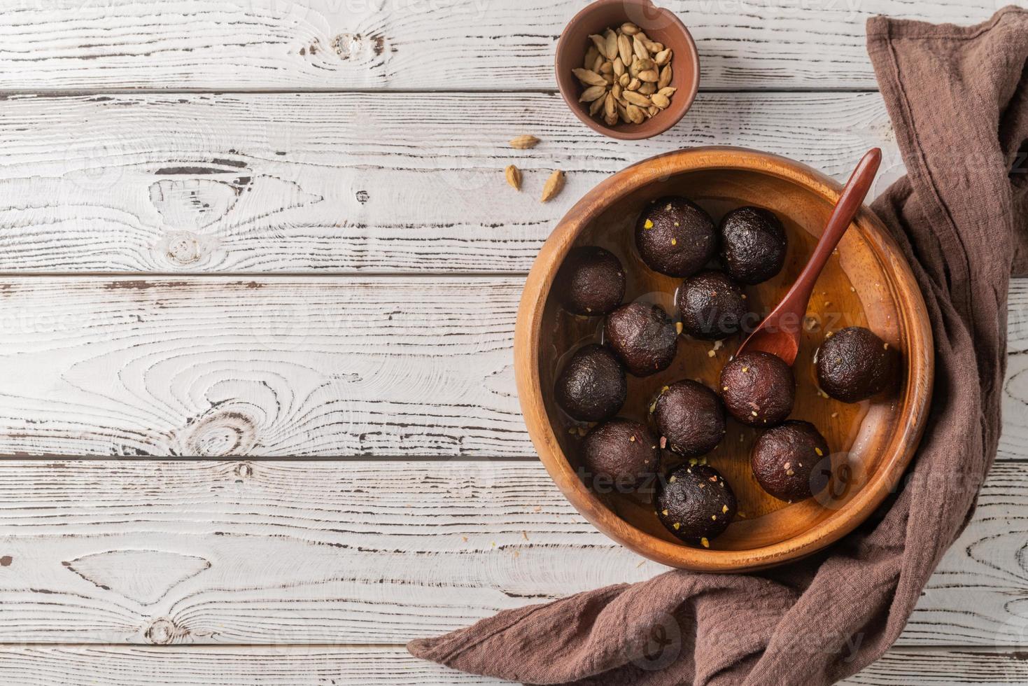 Sweet Gulab Jamun in wooden bowl on rustic background 5561026 Stock ...