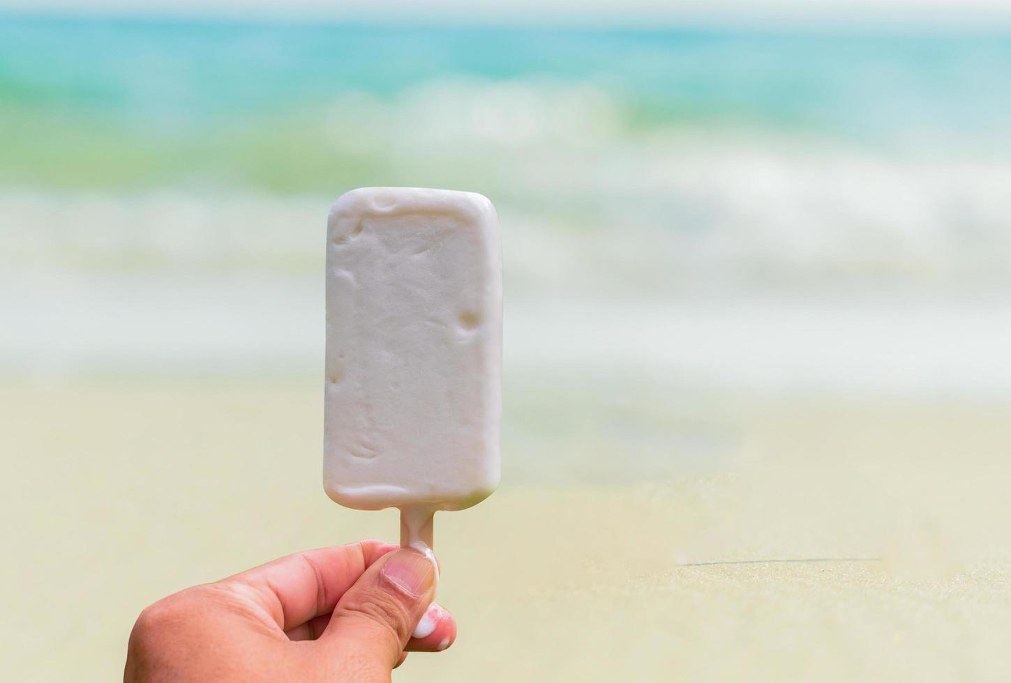 Ice cream on beautiful summer beach background photo