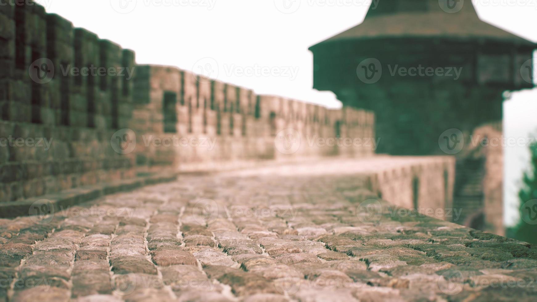 old castle walls at the sunset photo