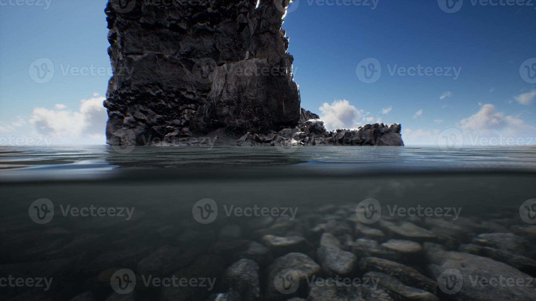 ocean seascape with sky and ocean wave splitted by waterline to underwater part photo