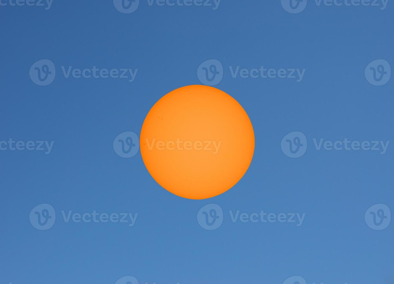 Sun in the sky with clouds photo
