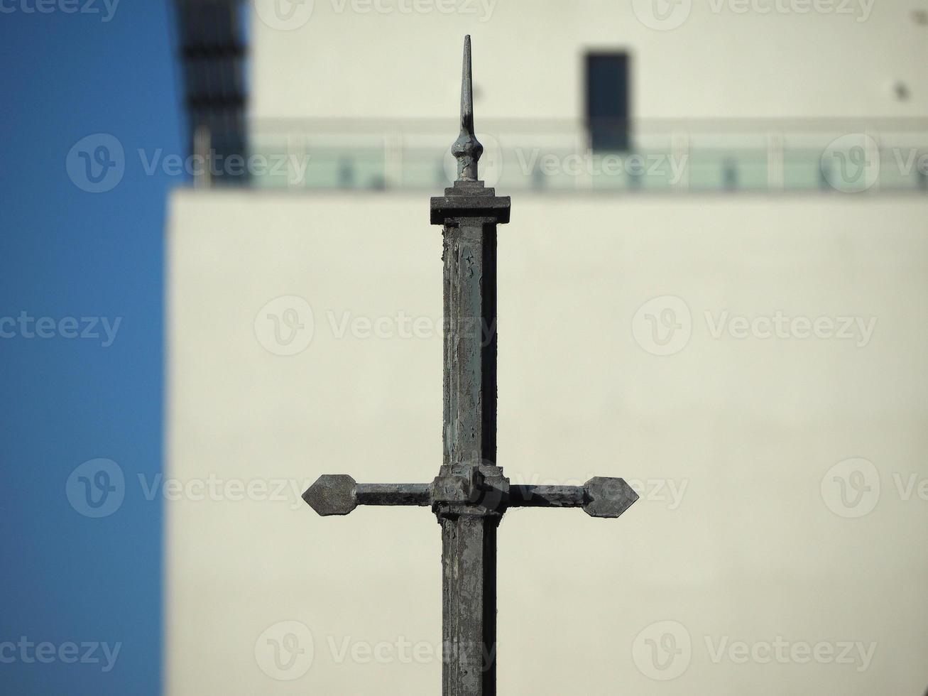 Cross on rooftop photo