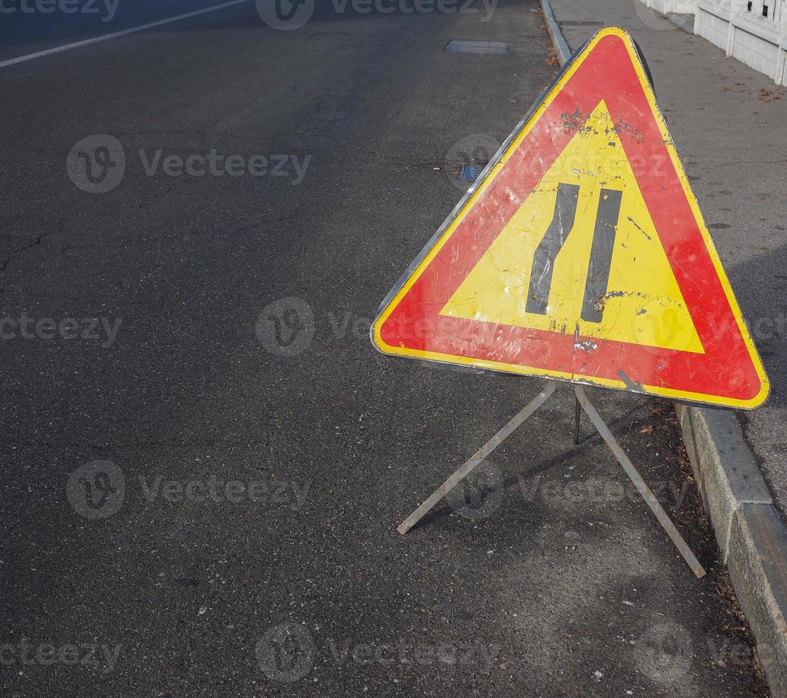 road narrows sign with copy space photo