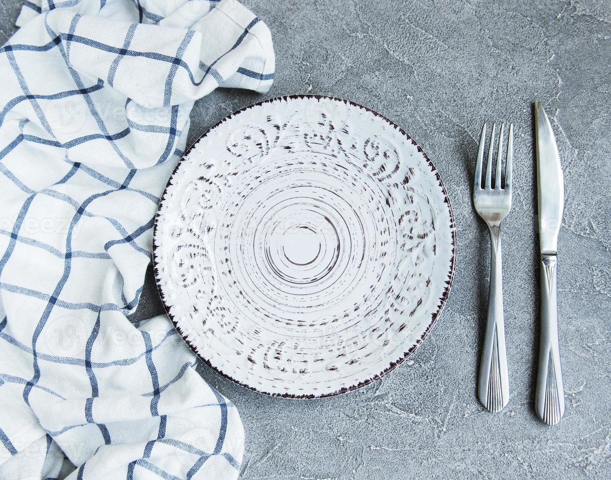 empty plate on tablecloth photo