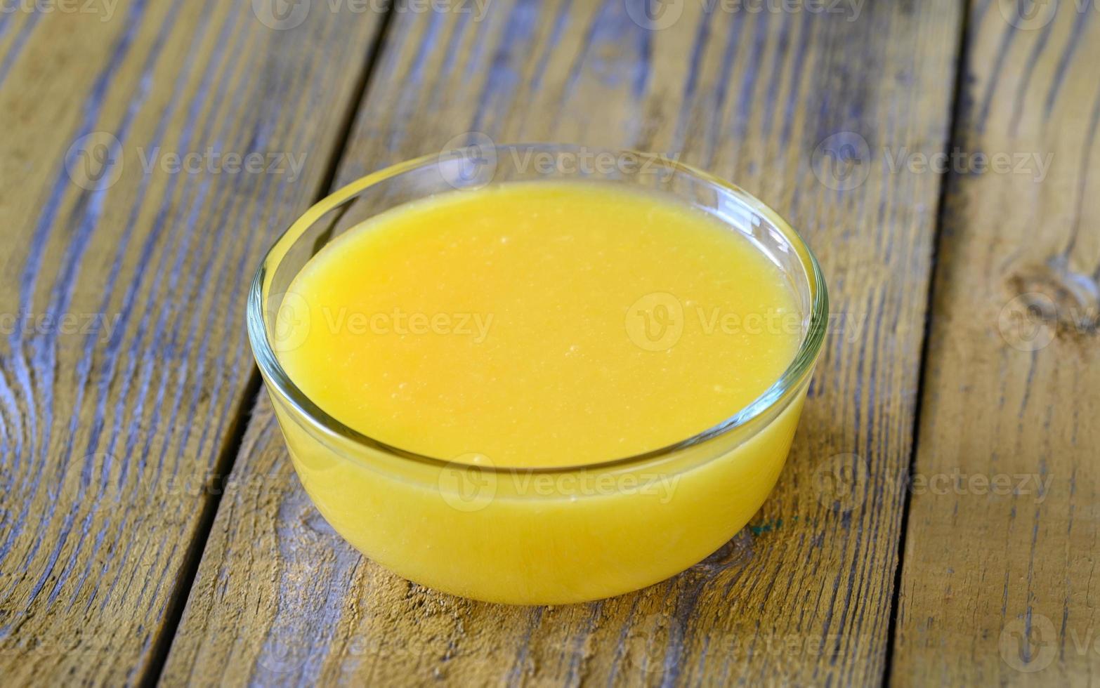 Glass bowl of lemon curd photo