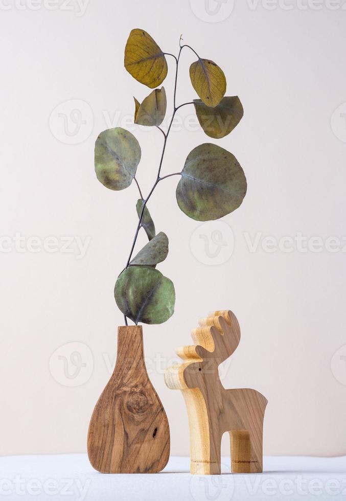 eucalyptus on wood vase photo