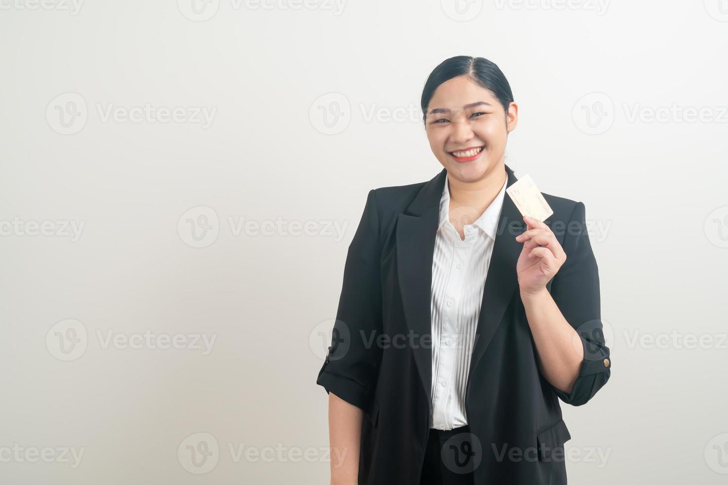 Asian woman holding credit card with white background photo