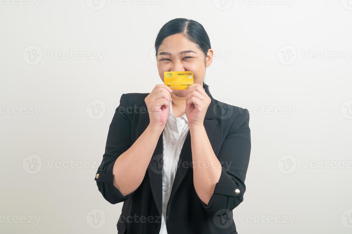 Asian woman holding credit card with white background photo