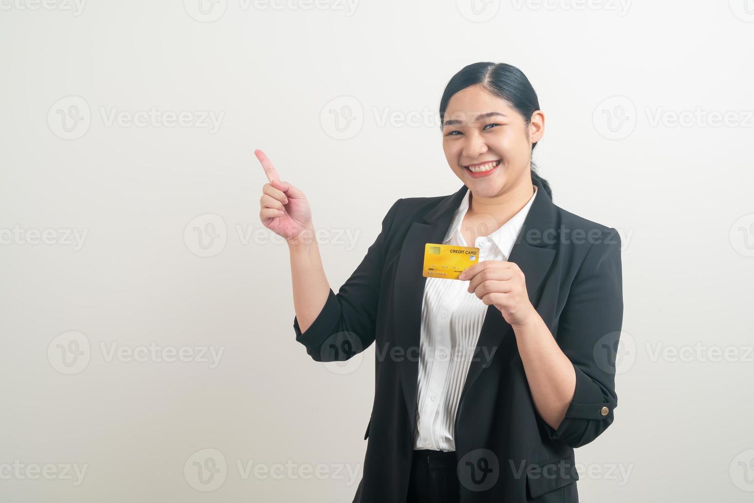 Asian woman holding credit card with white background photo