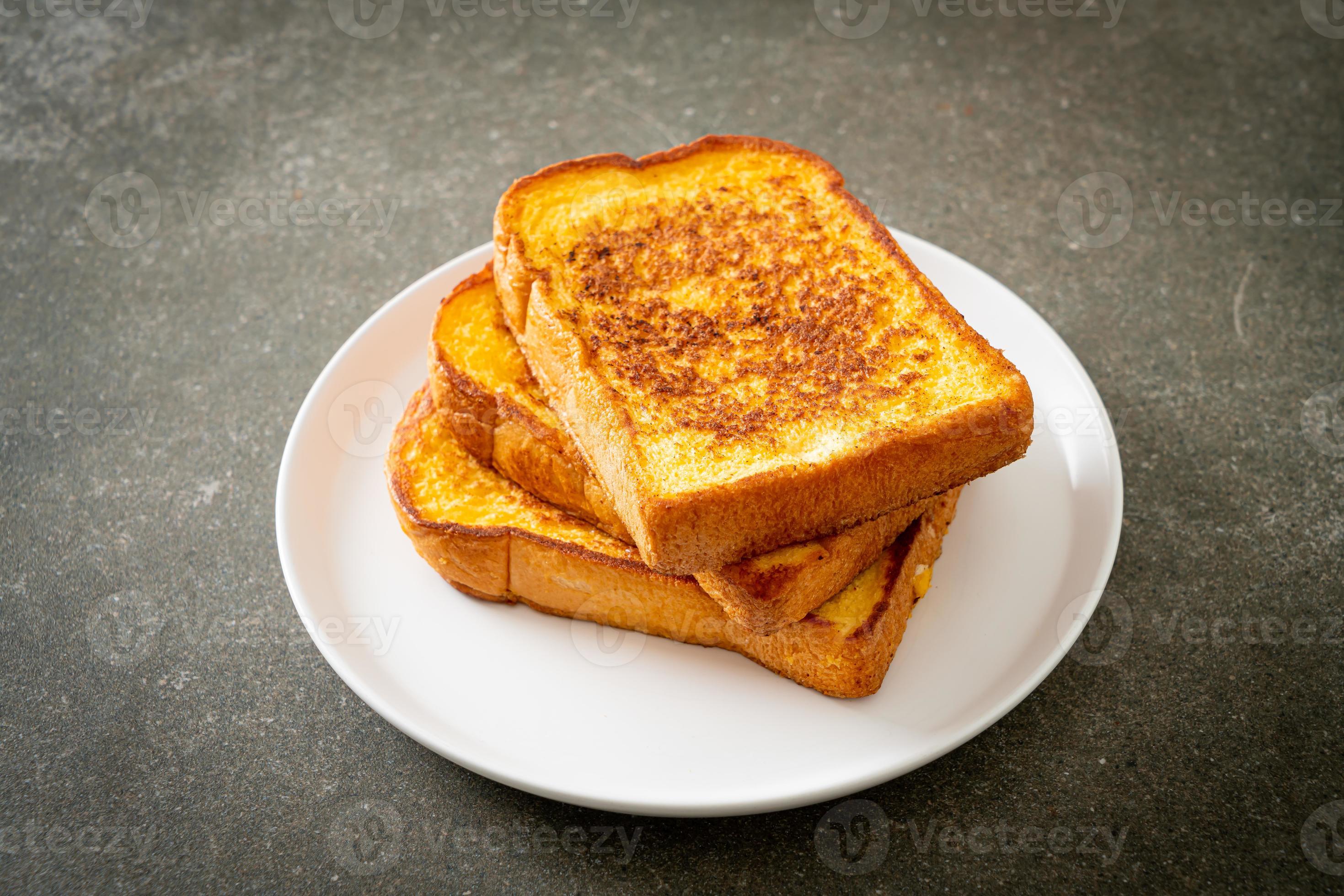 french toast on white plate 5576001 Stock Photo at Vecteezy