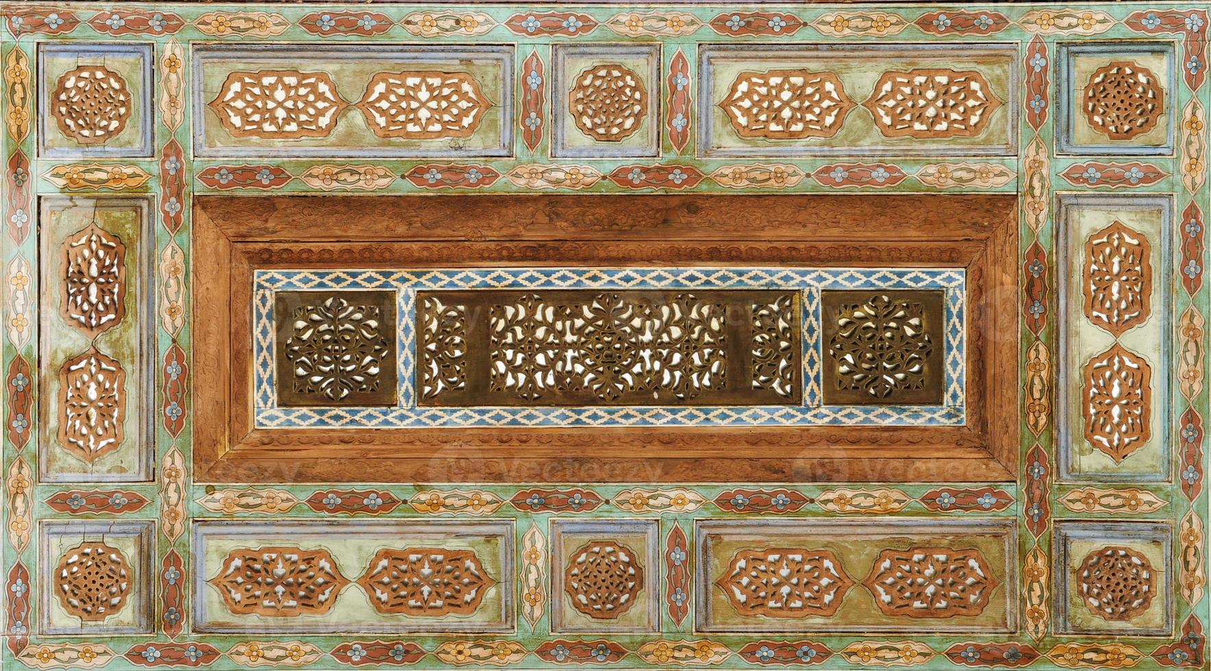ancient Asian mosaic made of wood. elements of Oriental ornament photo