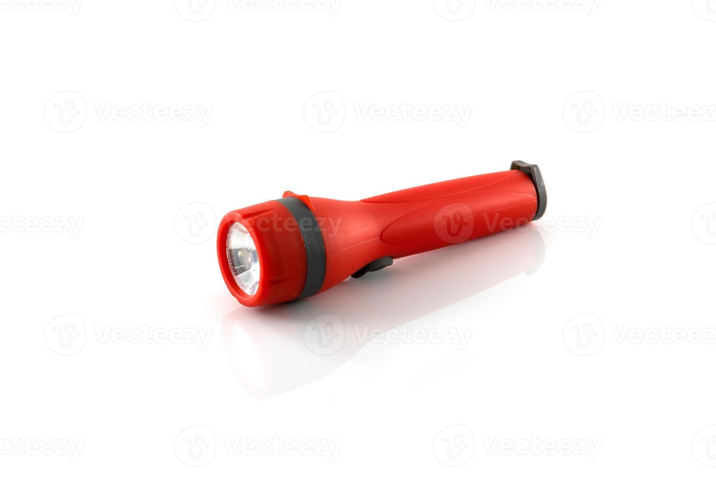 Red flashlight isolate on white background photo