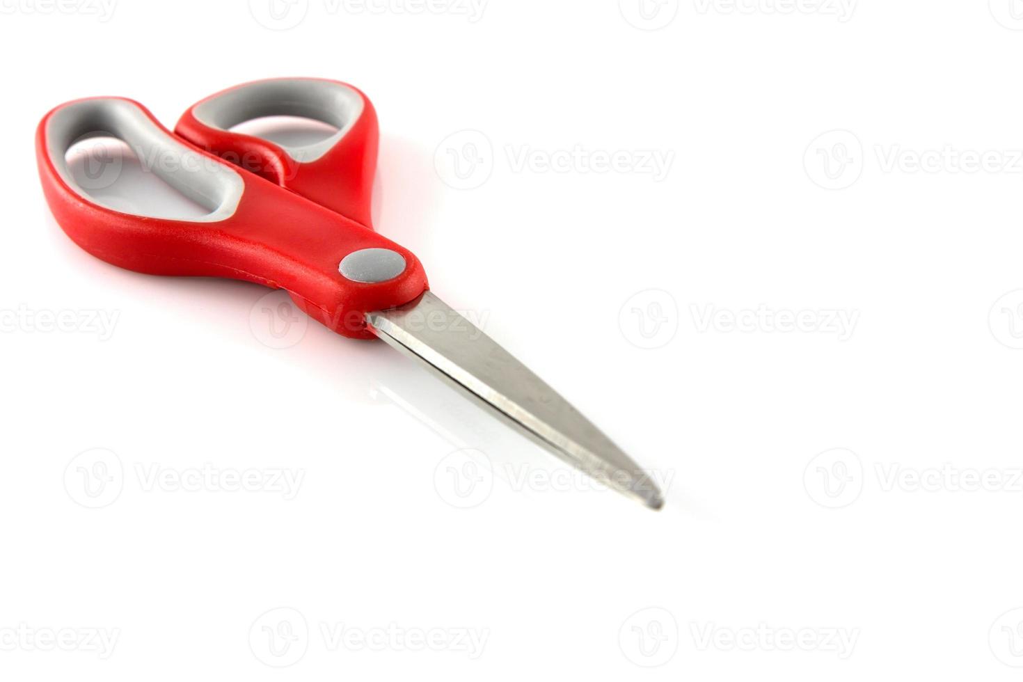 red scissors isolate on white background photo
