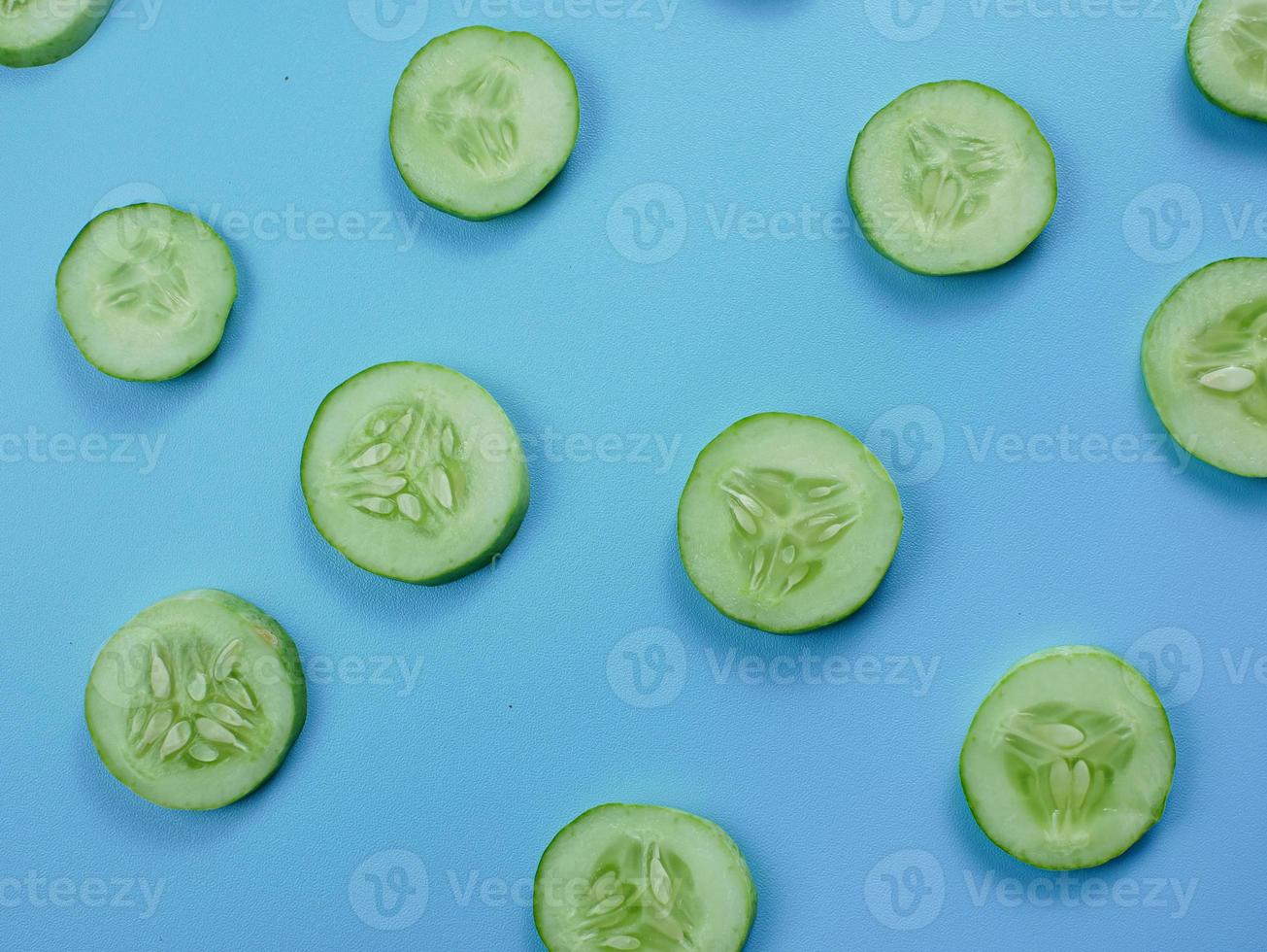 cucumber on a blue background. healthy diet food concept photo