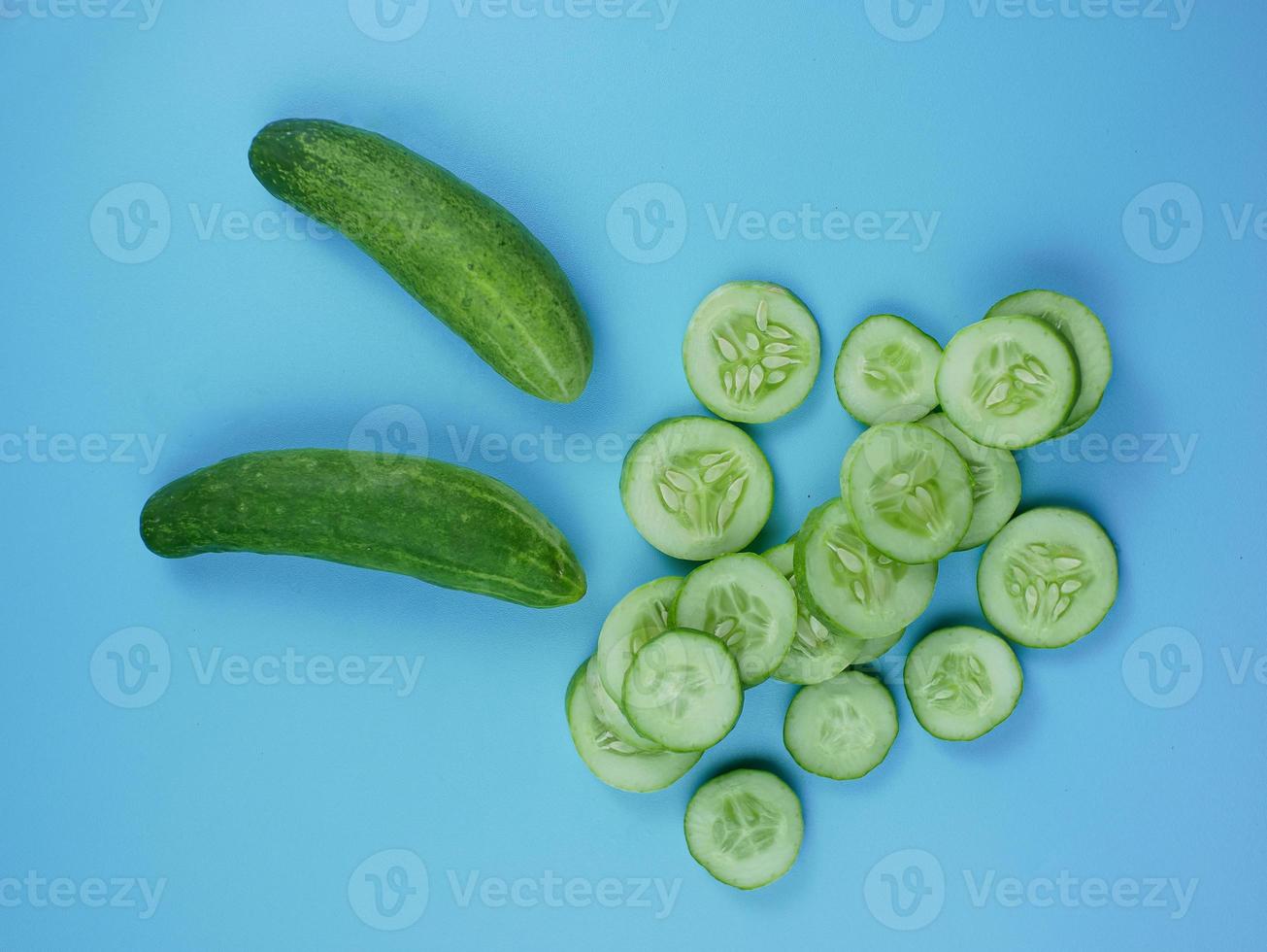 cucumber on a blue background. healthy diet food concept. still life. photo