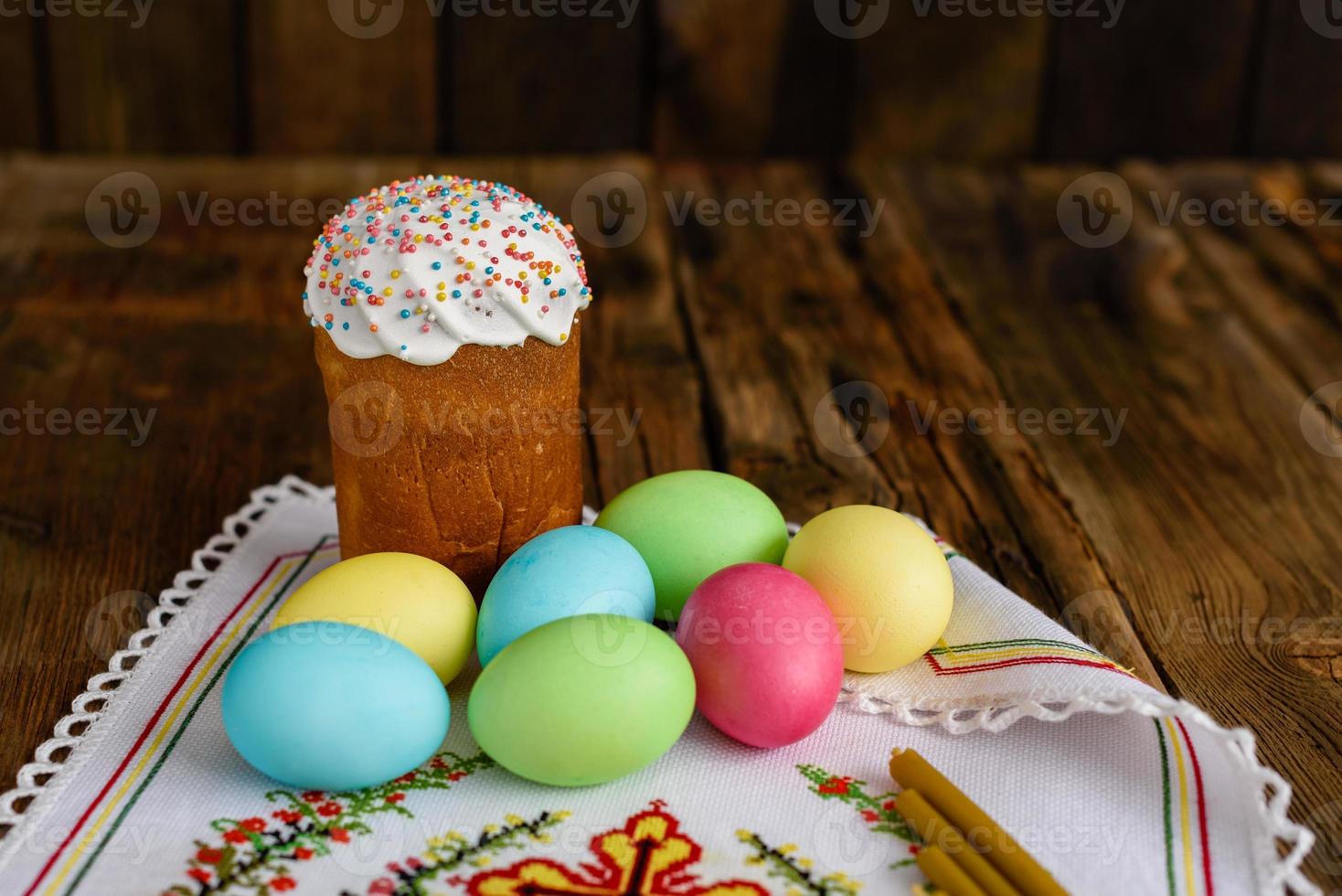 Easter cake and Easter eggs festive celebration table setting traditional decoration and treats photo