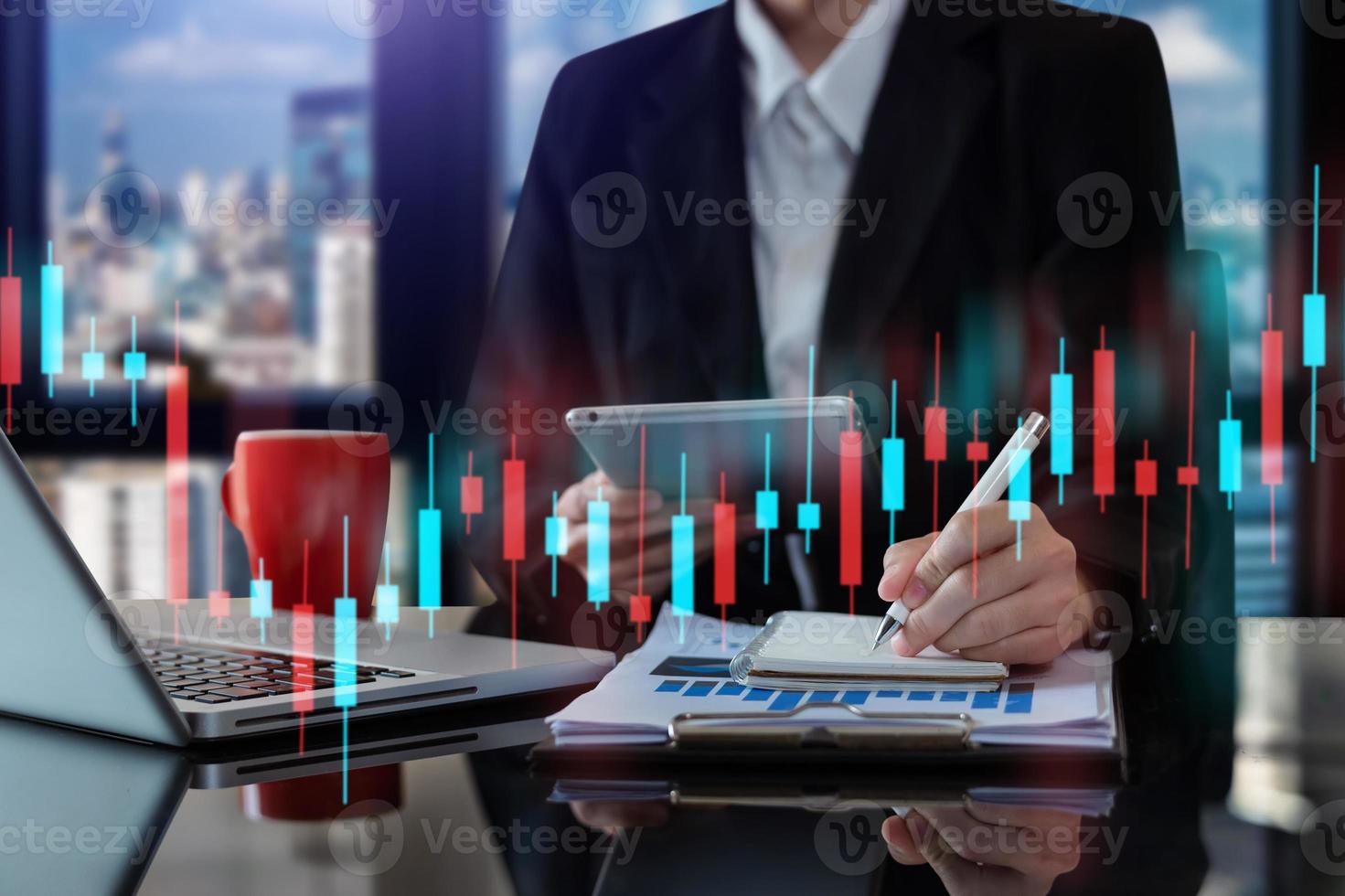 Two professional traides on technical price graph and indicator, red and green candlestick chart and stock trading computer photo