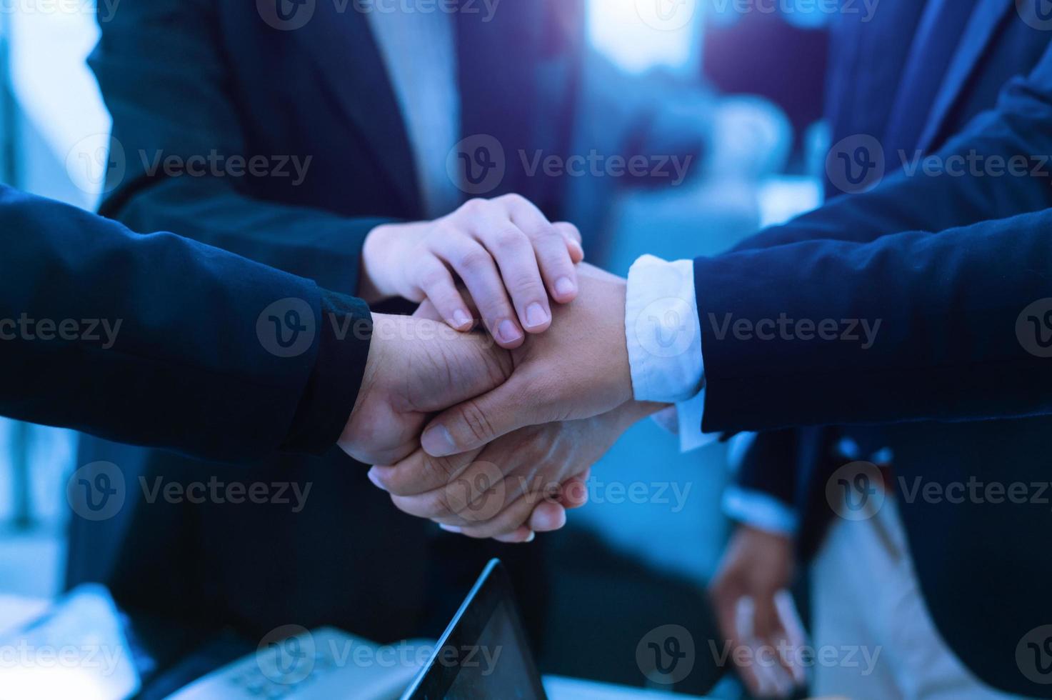 Business partnership handshake concept.Photo two coworkers handshaking process.Successful deal after great photo