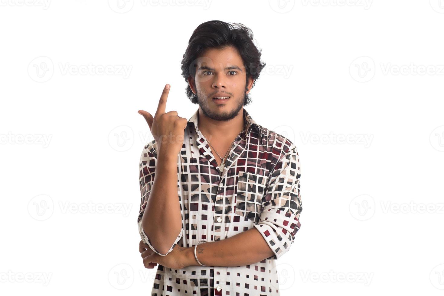 Young man posing on a white background photo