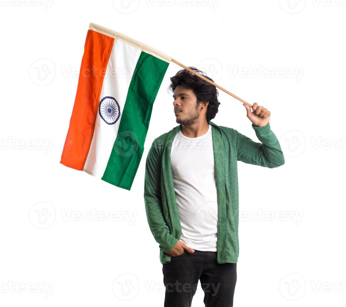 Young man with Indian flag or tricolor on white background, Indian Independence day, Indian Republic day photo