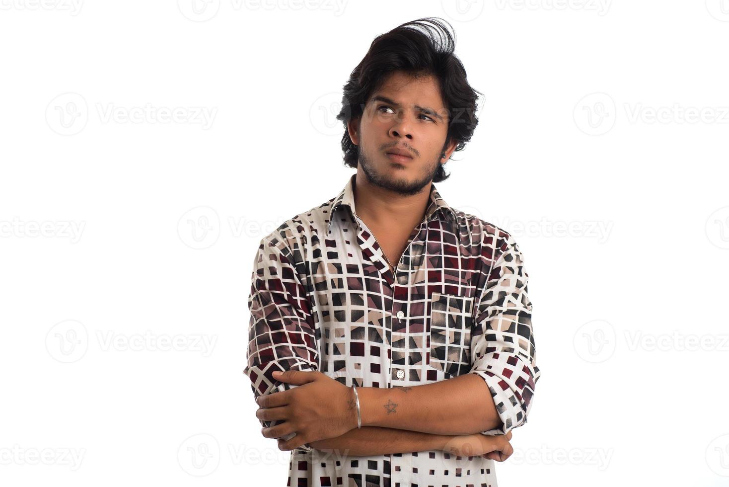 Young man posing on a white background photo