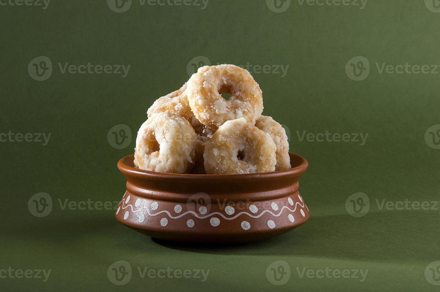 Indian Traditional Sweet Food Balushahi on a olive green background photo