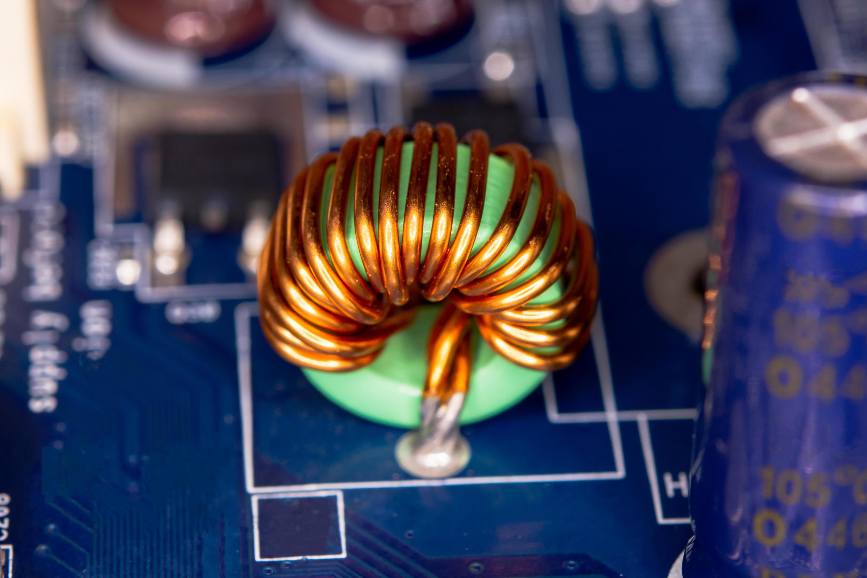 Inductor copper coils on the circuit board 5582041 Stock Photo at Vecteezy