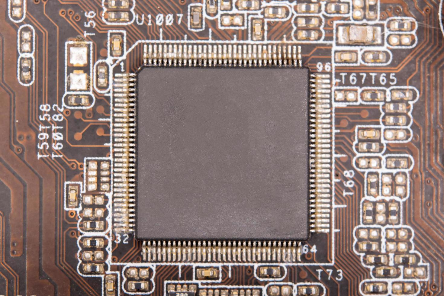 Close up blank microchip on Electronic circuit board. photo