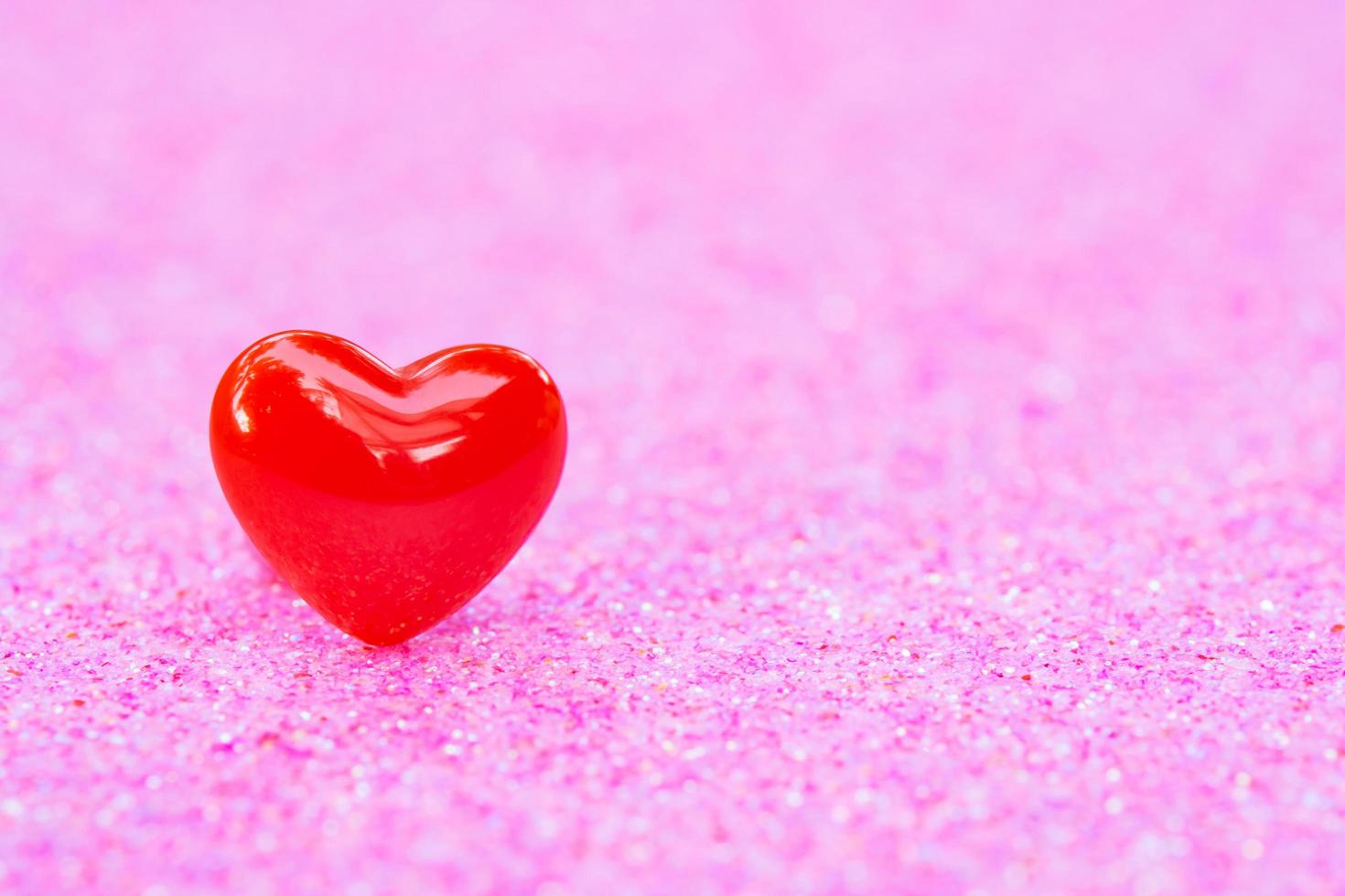 Valentines Day background with Red heart shapes on abstract light pink glitter background, Copy space photo