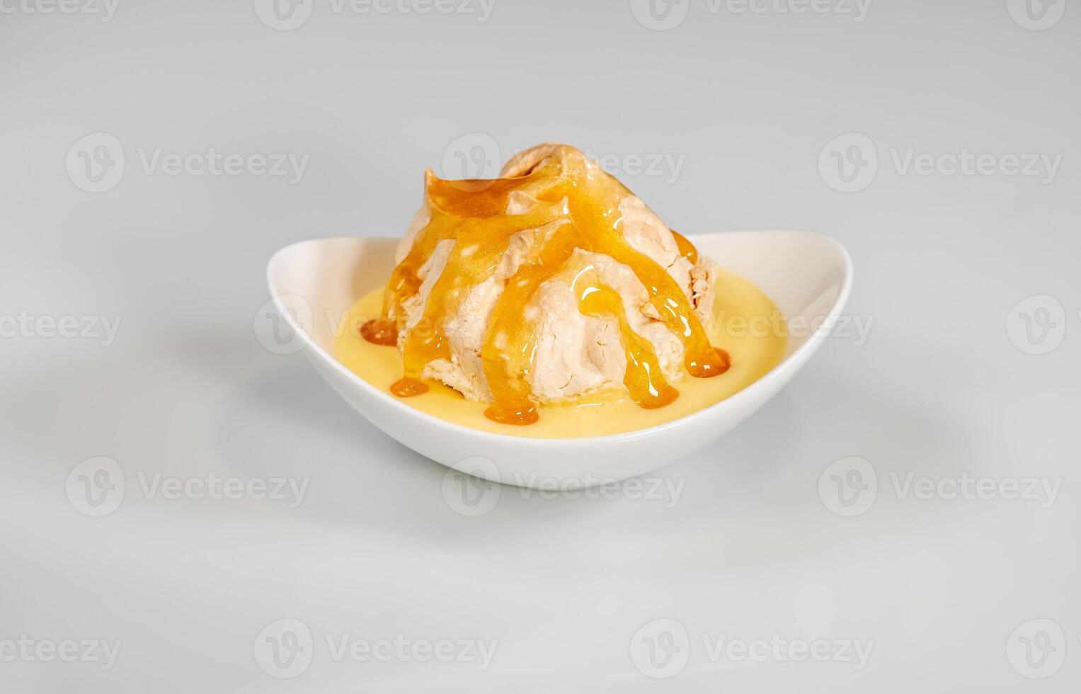 Floating island dessert 5583135 Stock Photo at Vecteezy