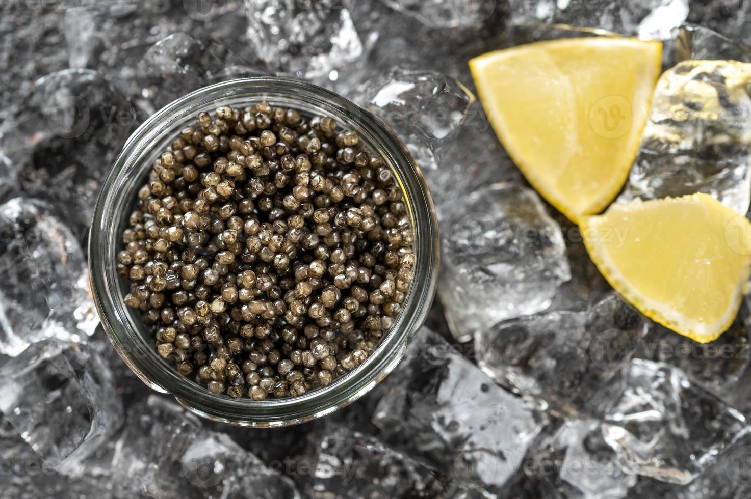 Bowl of black caviar photo