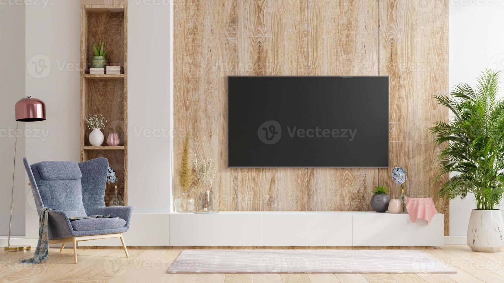 Smart TV on the wooden wall in living room with armchair,minimal design.  5583925 Stock Photo at Vecteezy