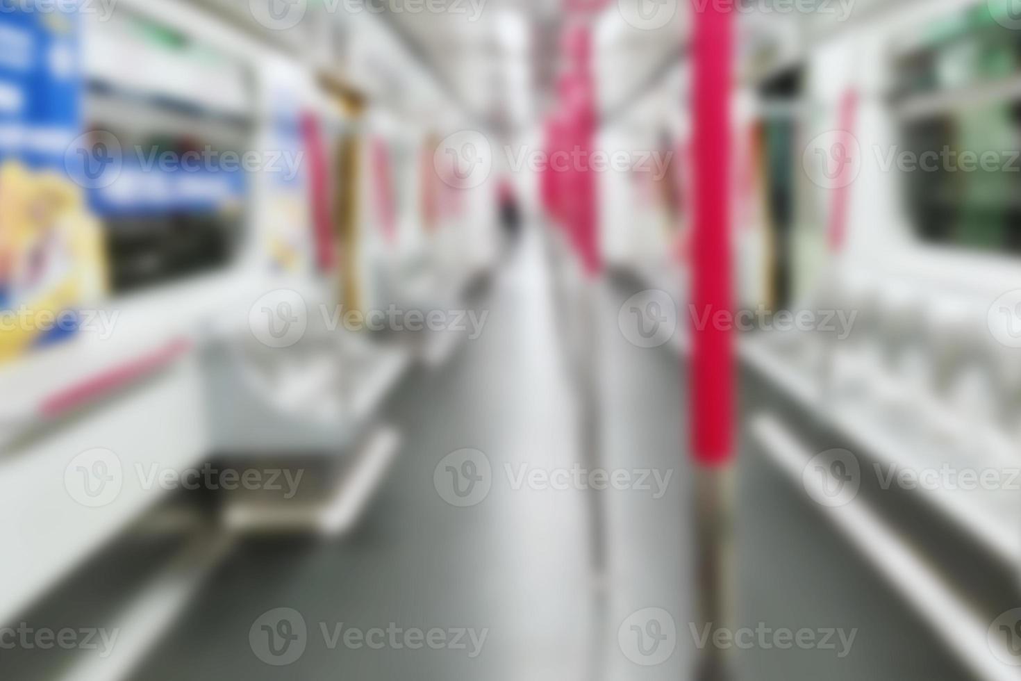 Blurred people on subway. inside train station. Defocused image photo