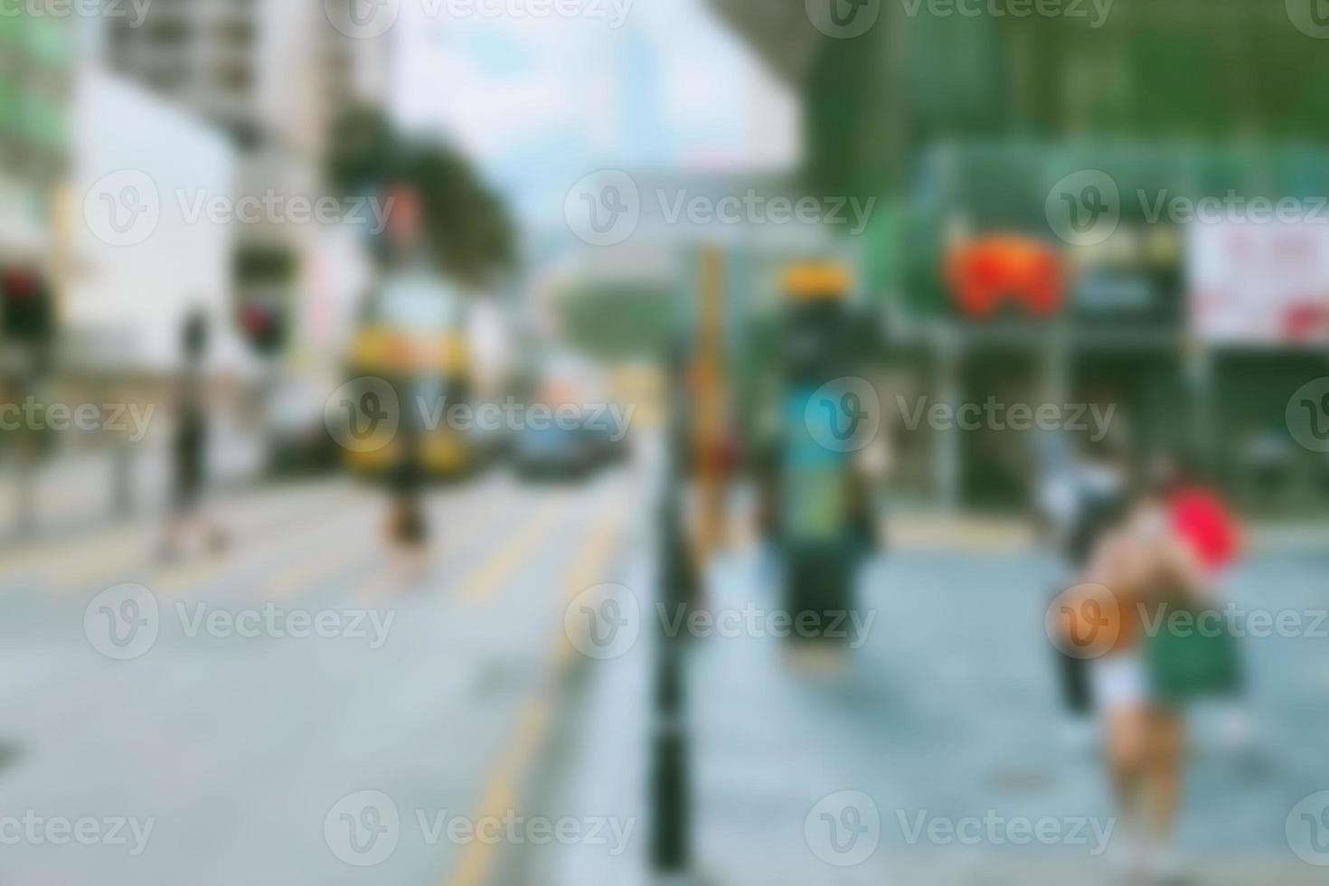 People at motion blur. Group of people walking open space. Defocused image photo