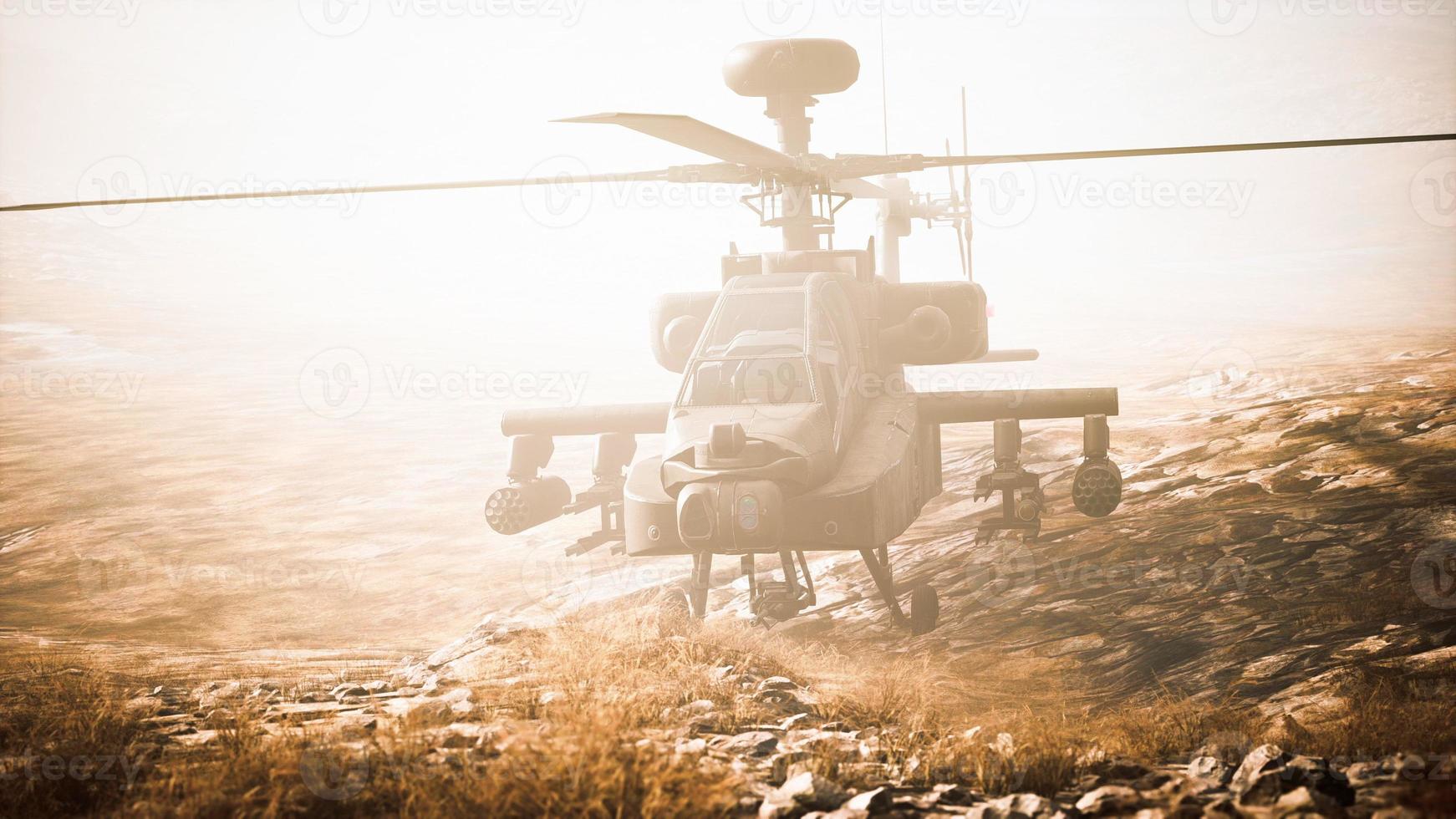 military helicopter in mountains at war photo