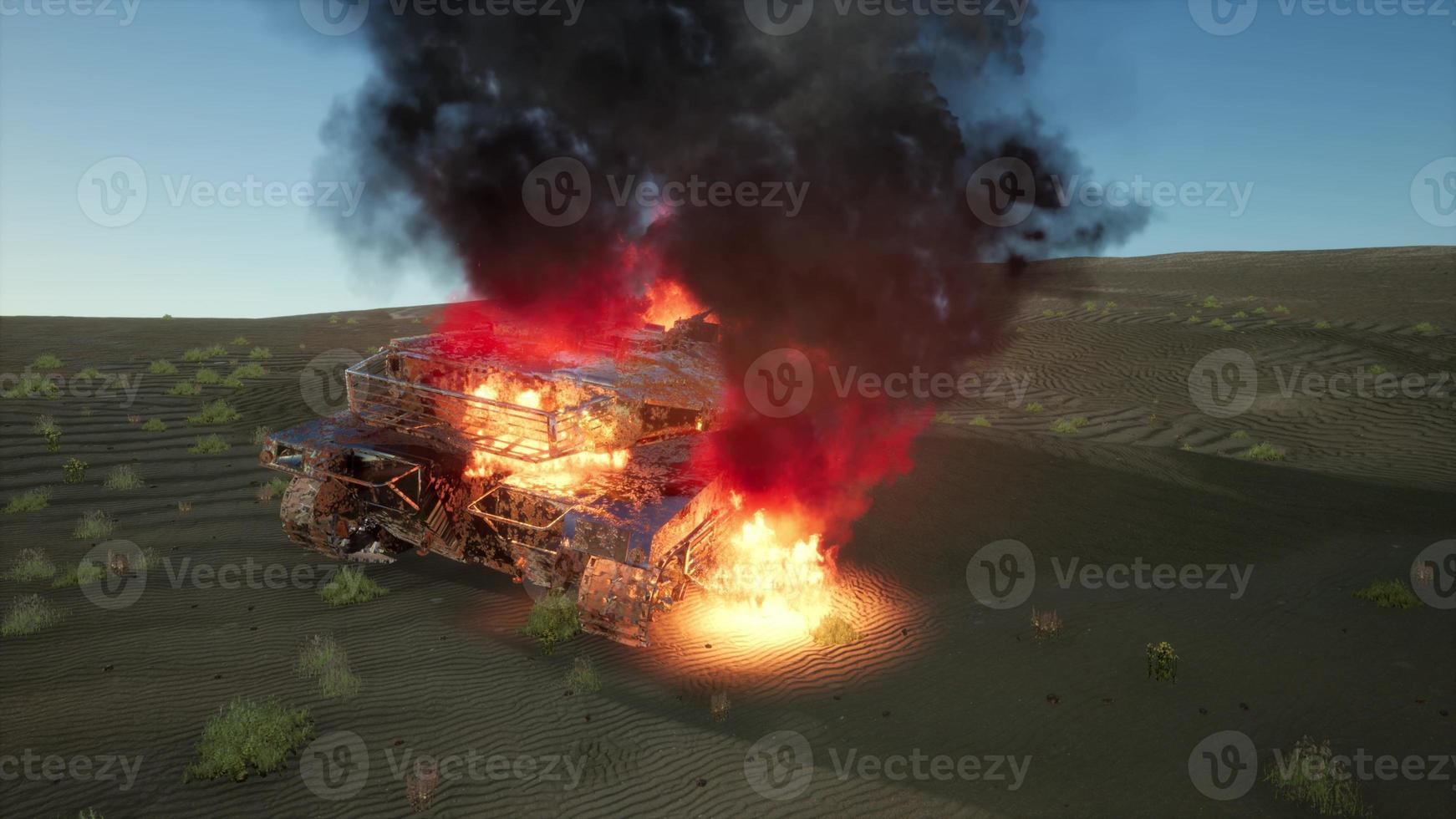 burned tank in the desert at sunset photo