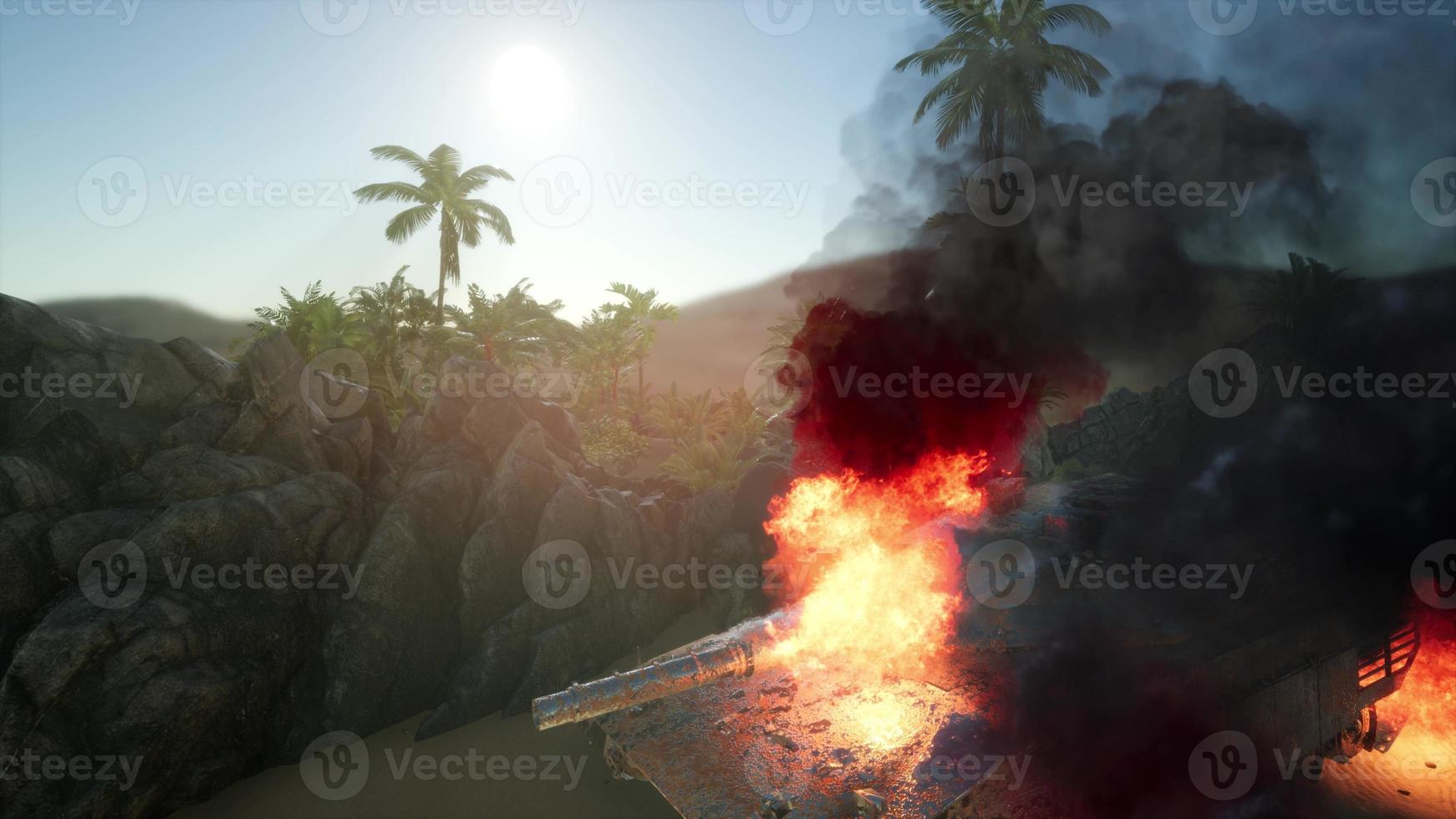 burned tank in the desert at sunset photo