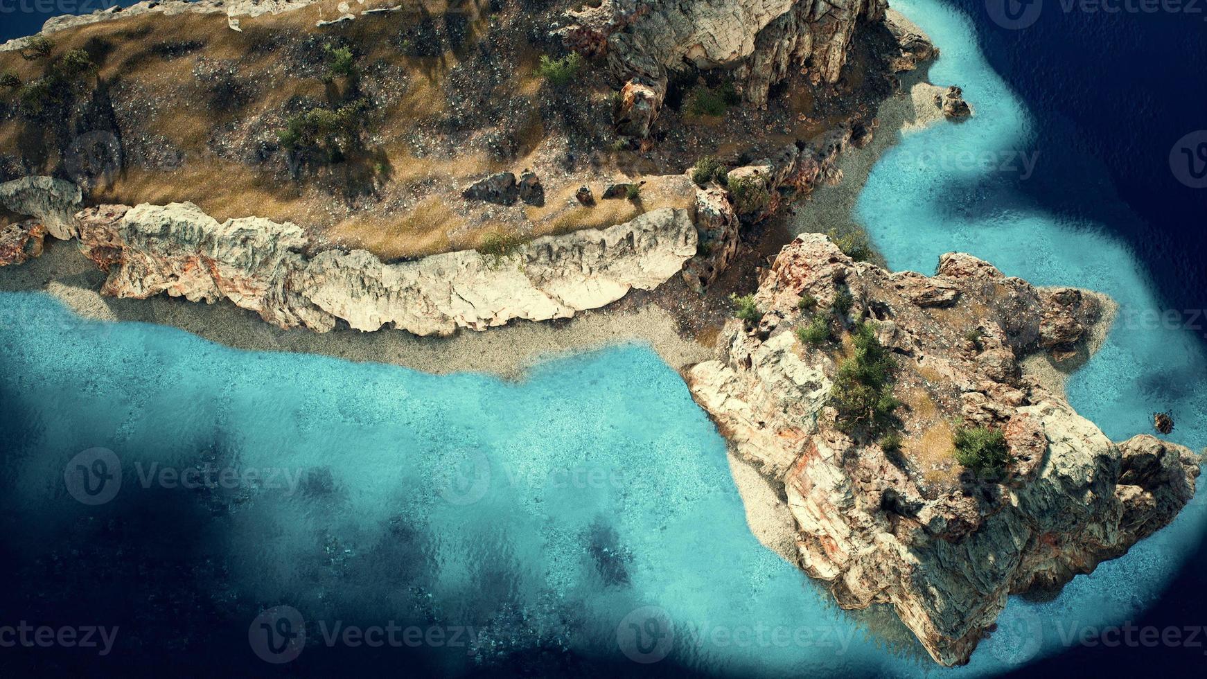aerial view from flying drone of rocky island in Atlantic ocean photo