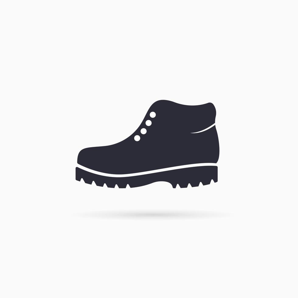 Boots icon. Simple hiking boot icon with shadow. Vector