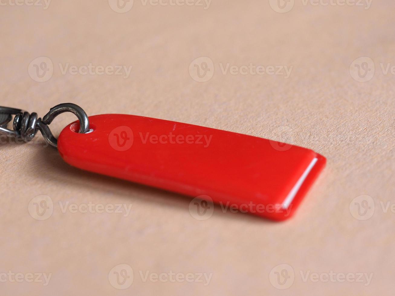 red key ring selective focus photo