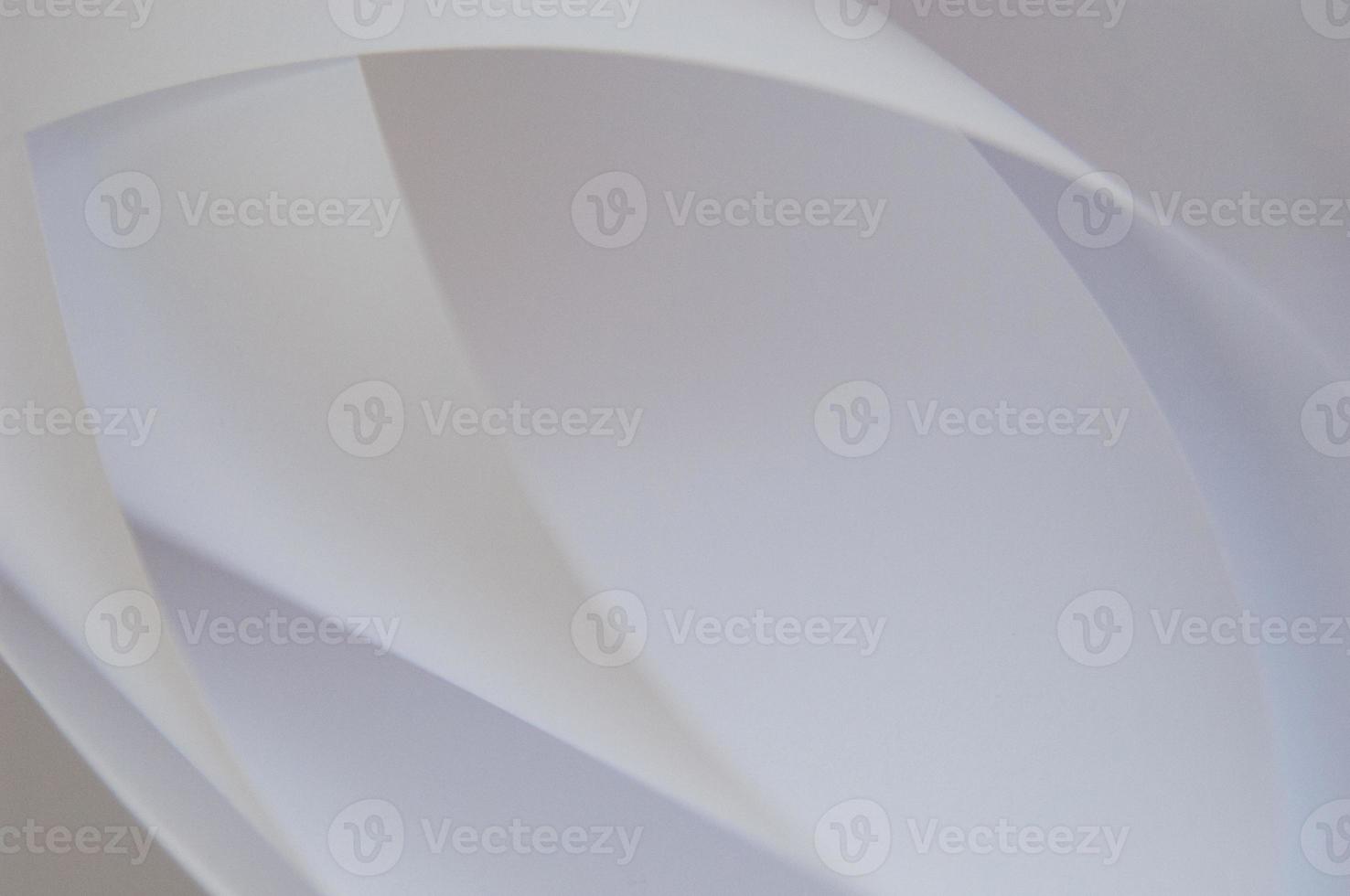 abstract background of a twisted sheet of white paper photo