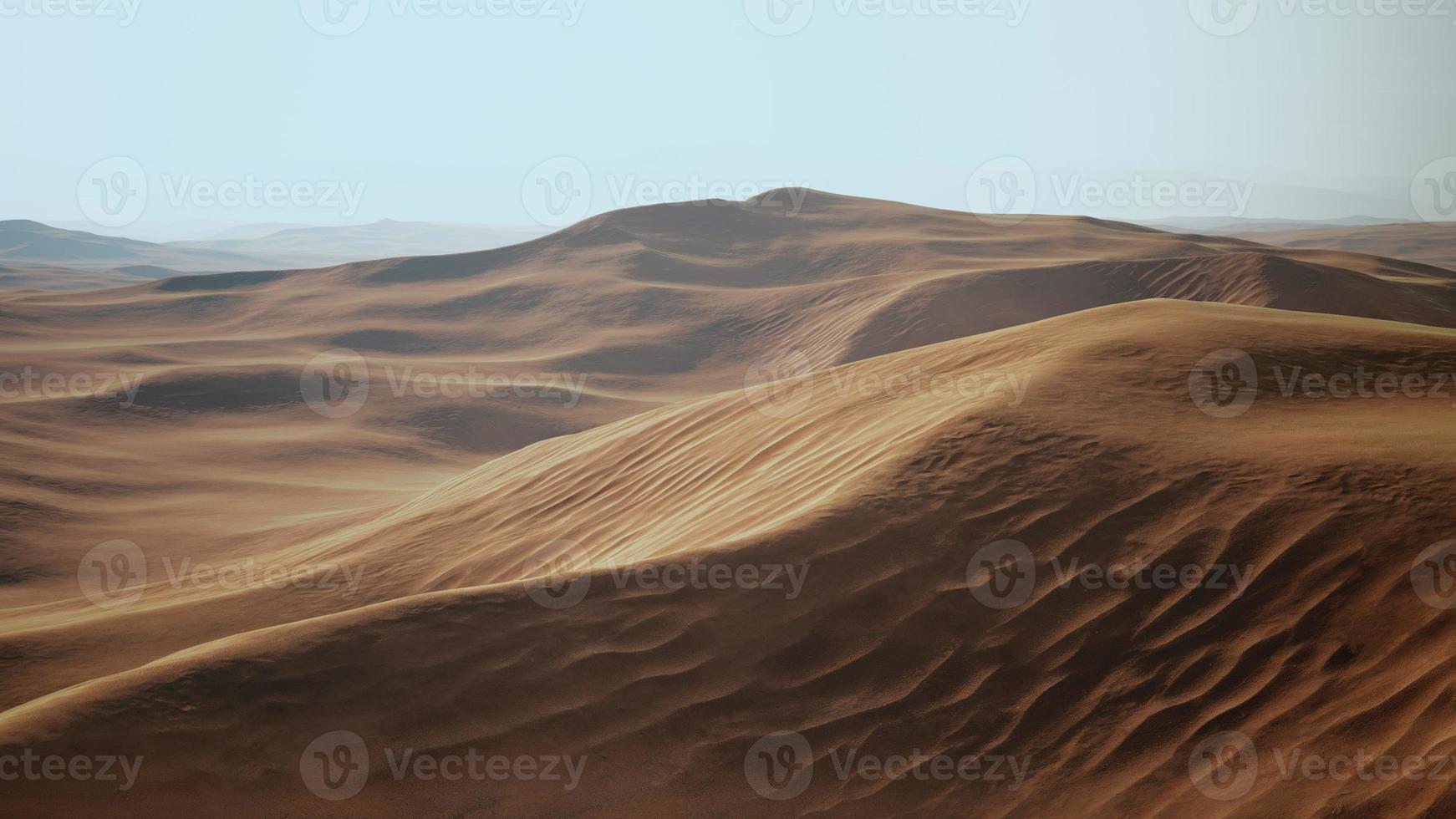 Sunset over the sand dunes in the desert. Death Valley, USA photo